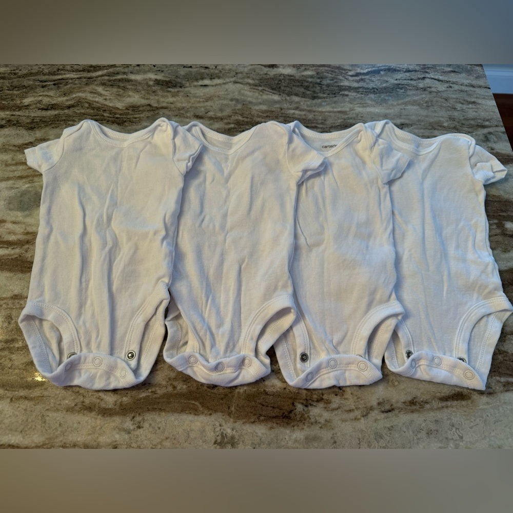 Carters white newborn onesies x4